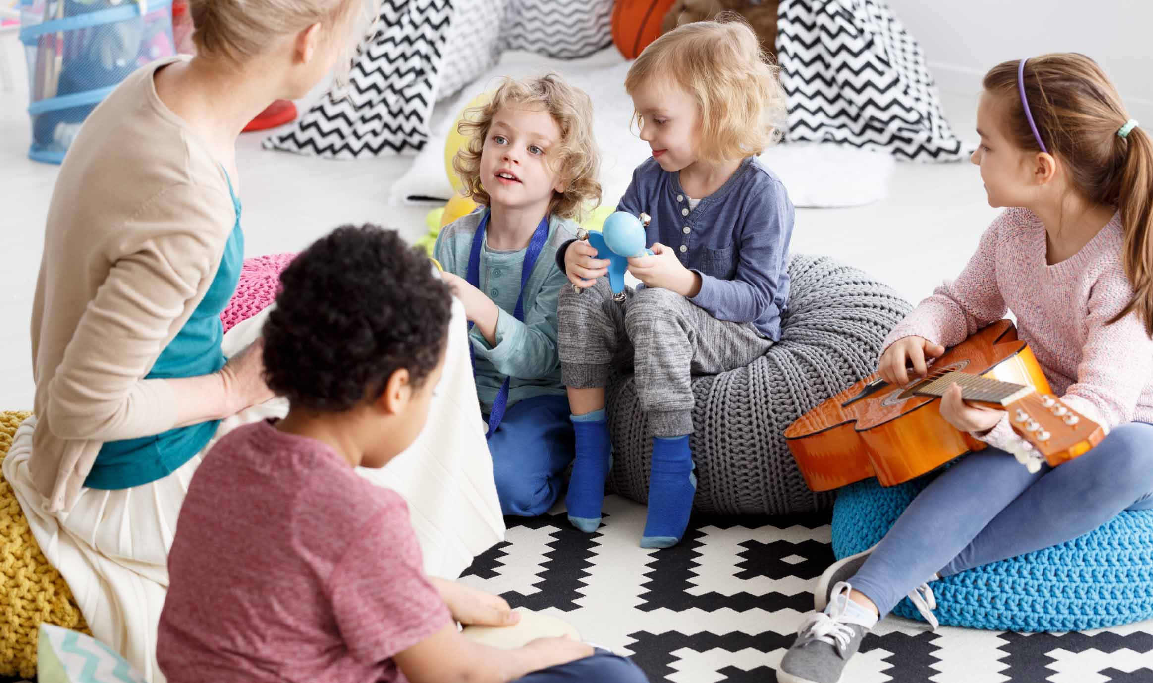 A group of children sitting together at daycare